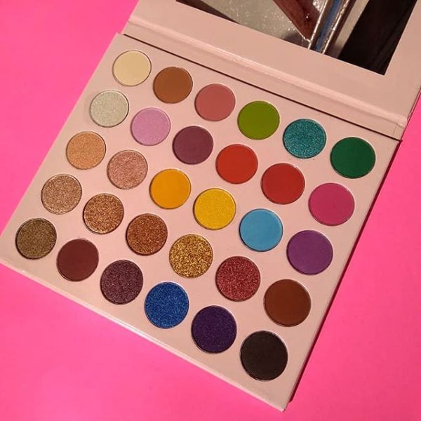 Glitter Galaxy DayDream Eyeshadow Palette with colorful matte, shimmer, metallic, and glitter eyeshadow shades in an open pastel pink palette.