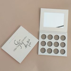 Glitter Galaxy Moon Mist matte eyeshadow palette with 12 neutral nude brown eyeshadow shades and built-in mirror.