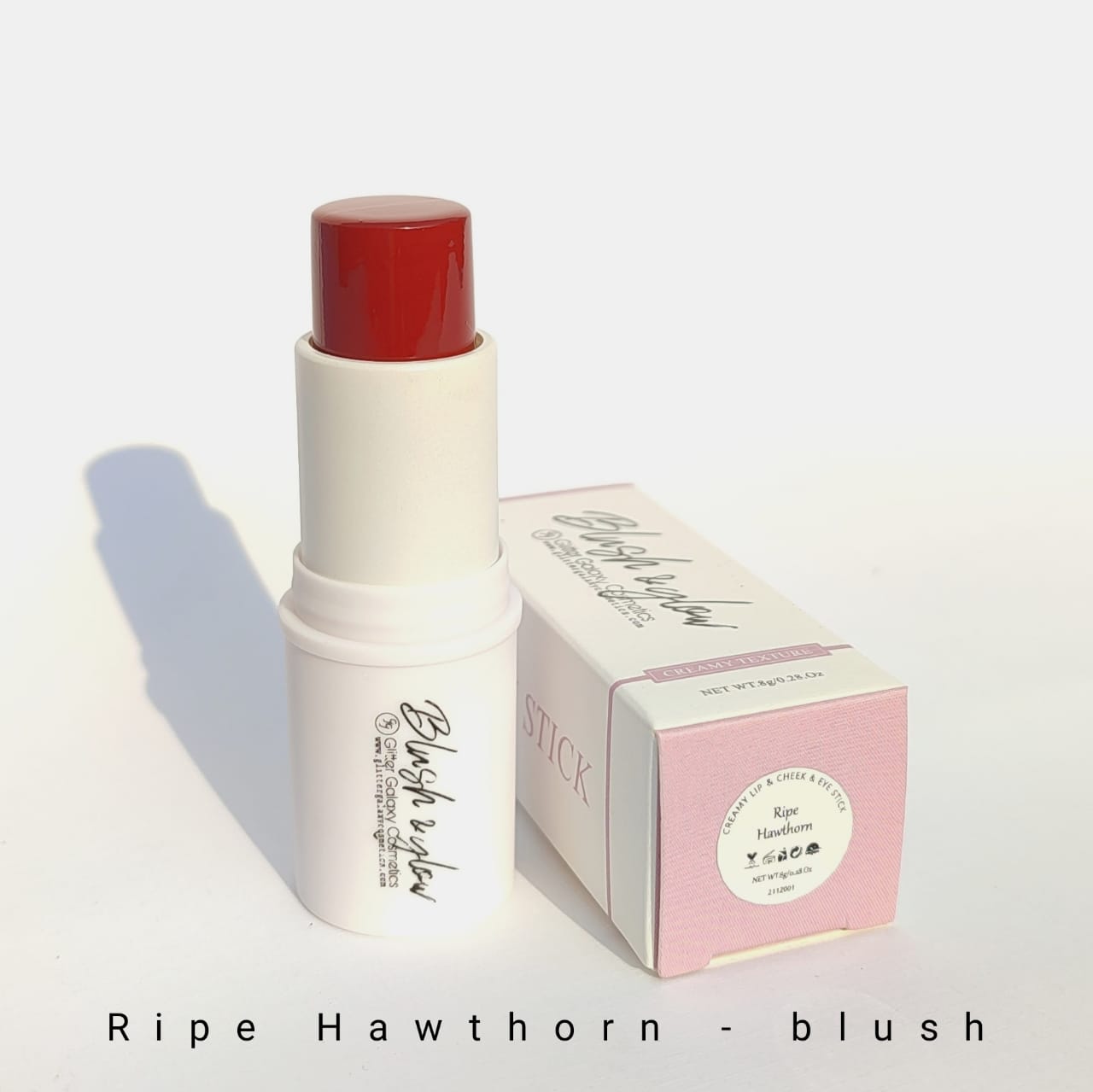 Glitter Galaxy Cosmetics Ripe Hawthorn Blush Stick featuring a creamy deep red blush in a twist-up stick with elegant matte packaging for bold, natural-looking makeup.
