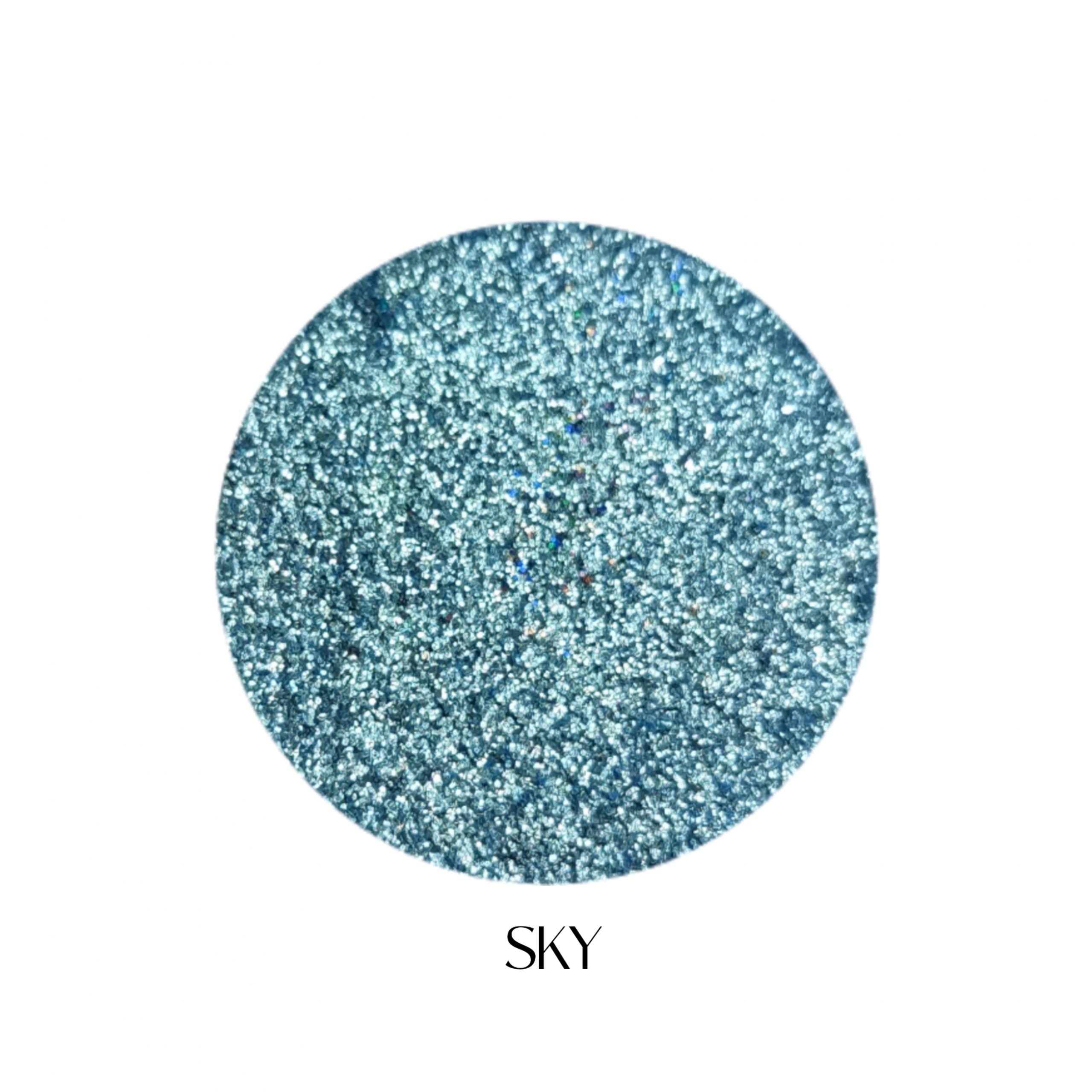 Glitter Galaxy Cosmetics Sky holographic cosmetic glitter featuring ultra-fine icy blue shimmer with silver and rainbow reflective multidimensional sparkle.