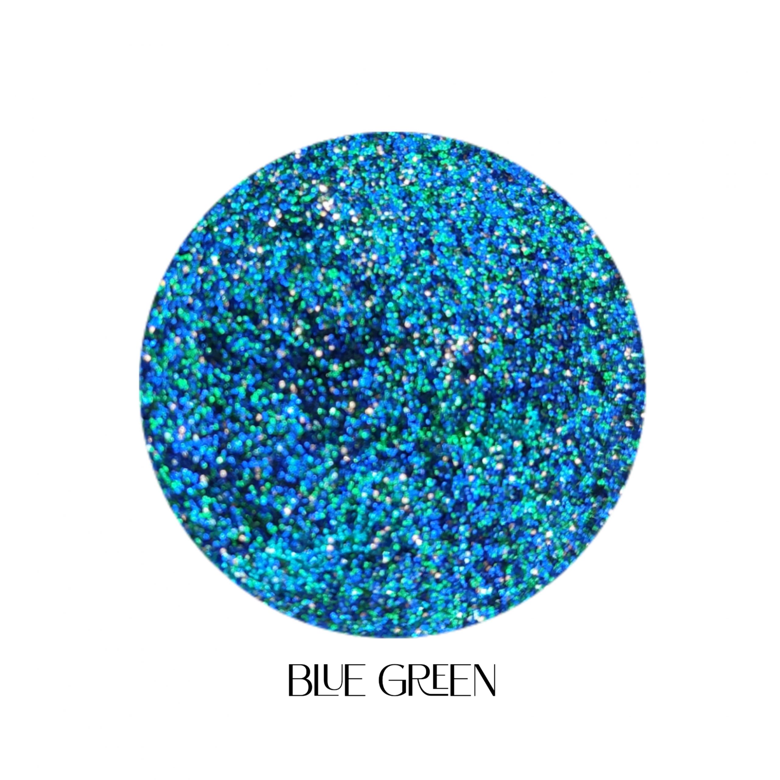 Glitter Galaxy Cosmetics Blue Green holographic cosmetic glitter featuring ultra-fine blue, teal, and emerald green shimmer with vibrant rainbow reflective multidimensional sparkle.