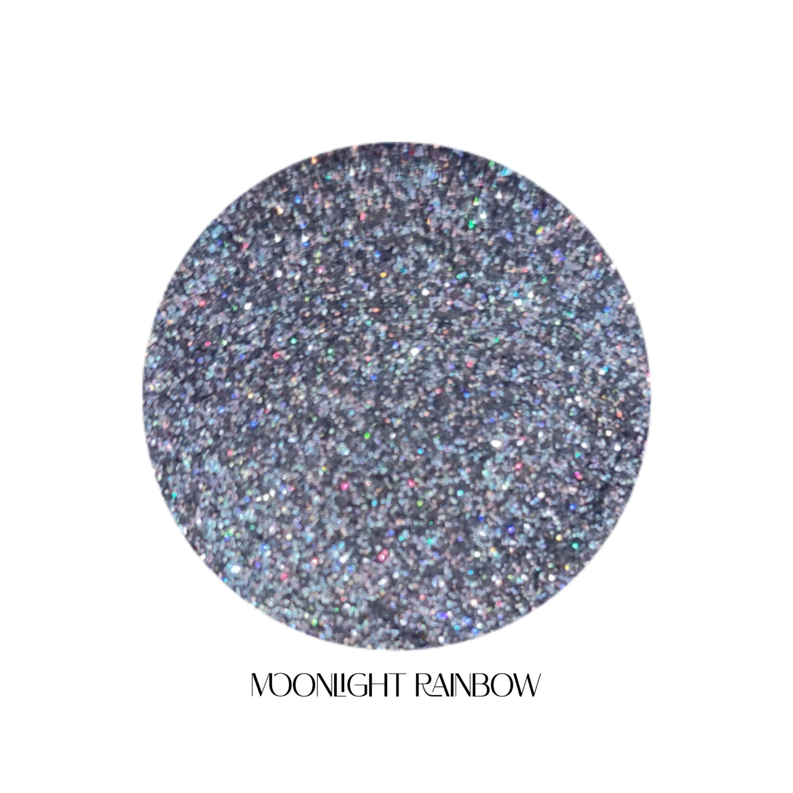 glitter galaxy cosmetics moonlight rainbow holographic cosmetic glitter featuring ultra-fine silver shimmer with rainbow reflective multidimensional sparkle.
