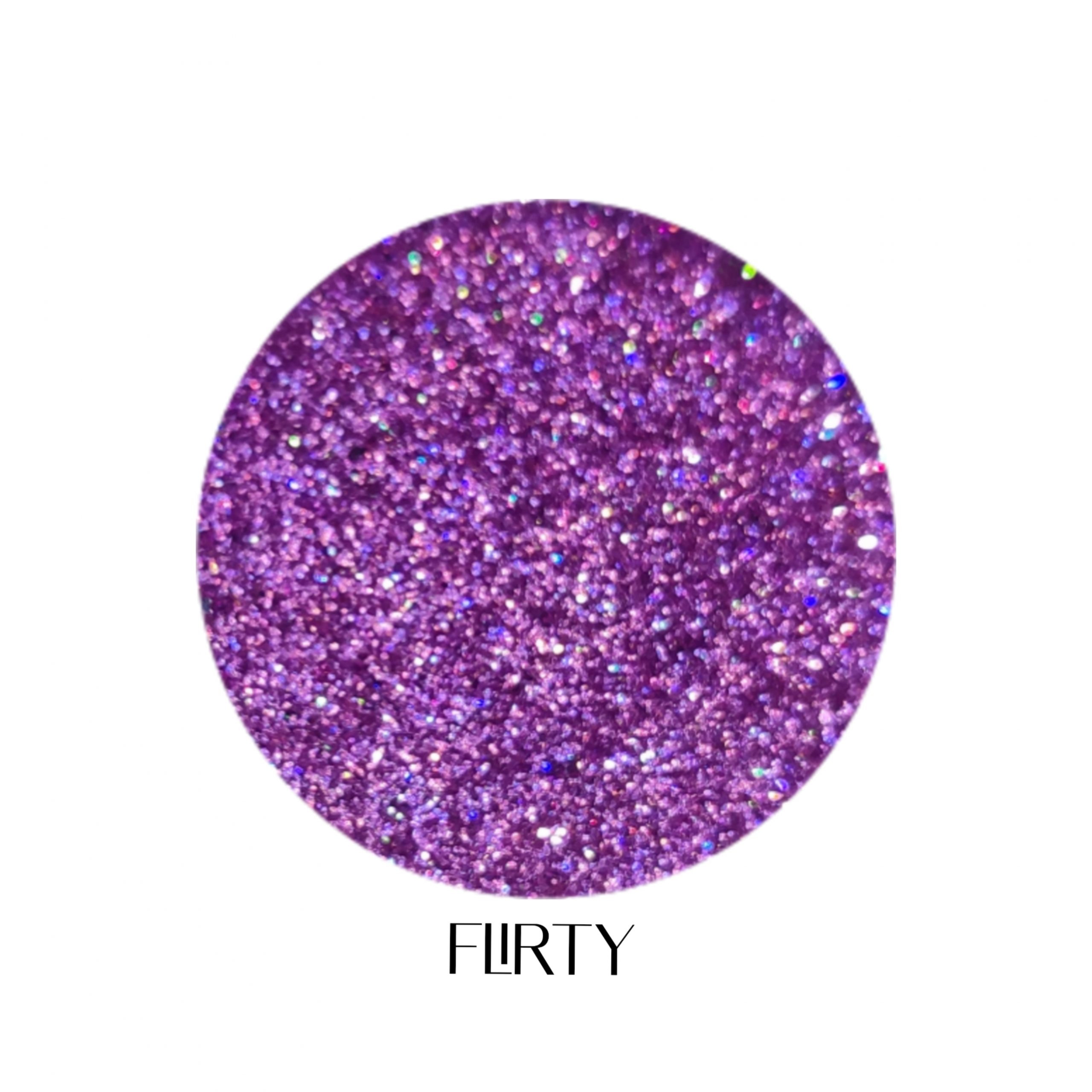 glitter galaxy cosmetics flirty holographic cosmetic glitter featuring ultra-fine lavender purple shimmer with vibrant rainbow reflective multidimensional sparkle.