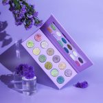 Glitter Galaxy Quartz Super Foiled Eyeshadow Palette with multicolor glitter and shimmer shades in luxury lavender packaging.