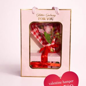 Glitter Galaxy Valentine gift hamper featuring a luxury cosmetic bouquet gift box with makeup products and premium pink floral packaging.